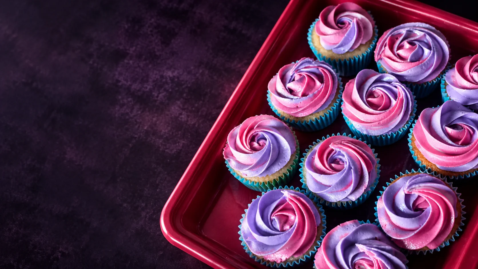 Pink and purple swirl buttercream cupcakes by Cupcake Tizzle