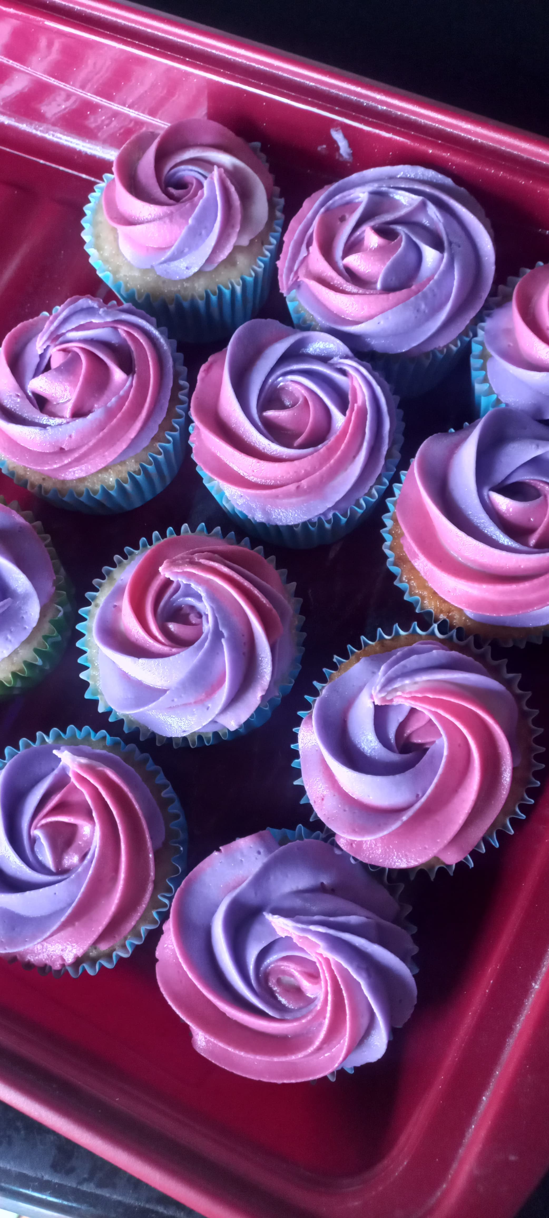 Pink and purple buttercream cupcakes by Cupcake Tizzle