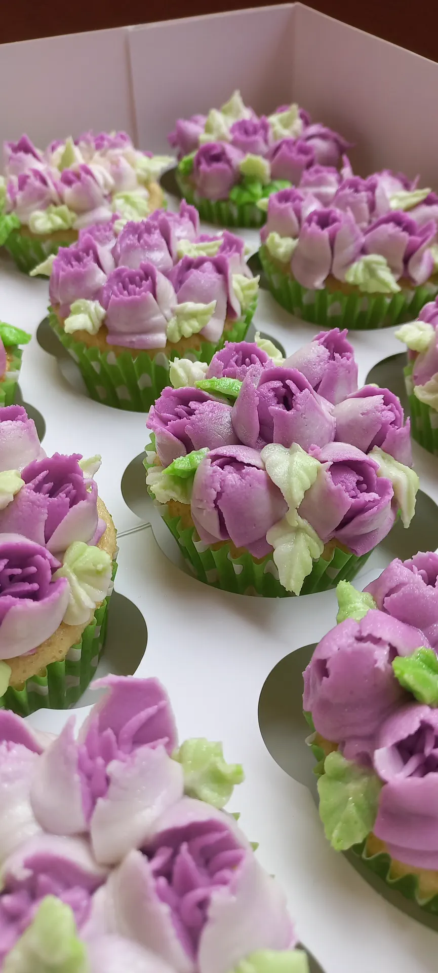 Purple floral buttercream cupcakes by Cupcake Tizzle