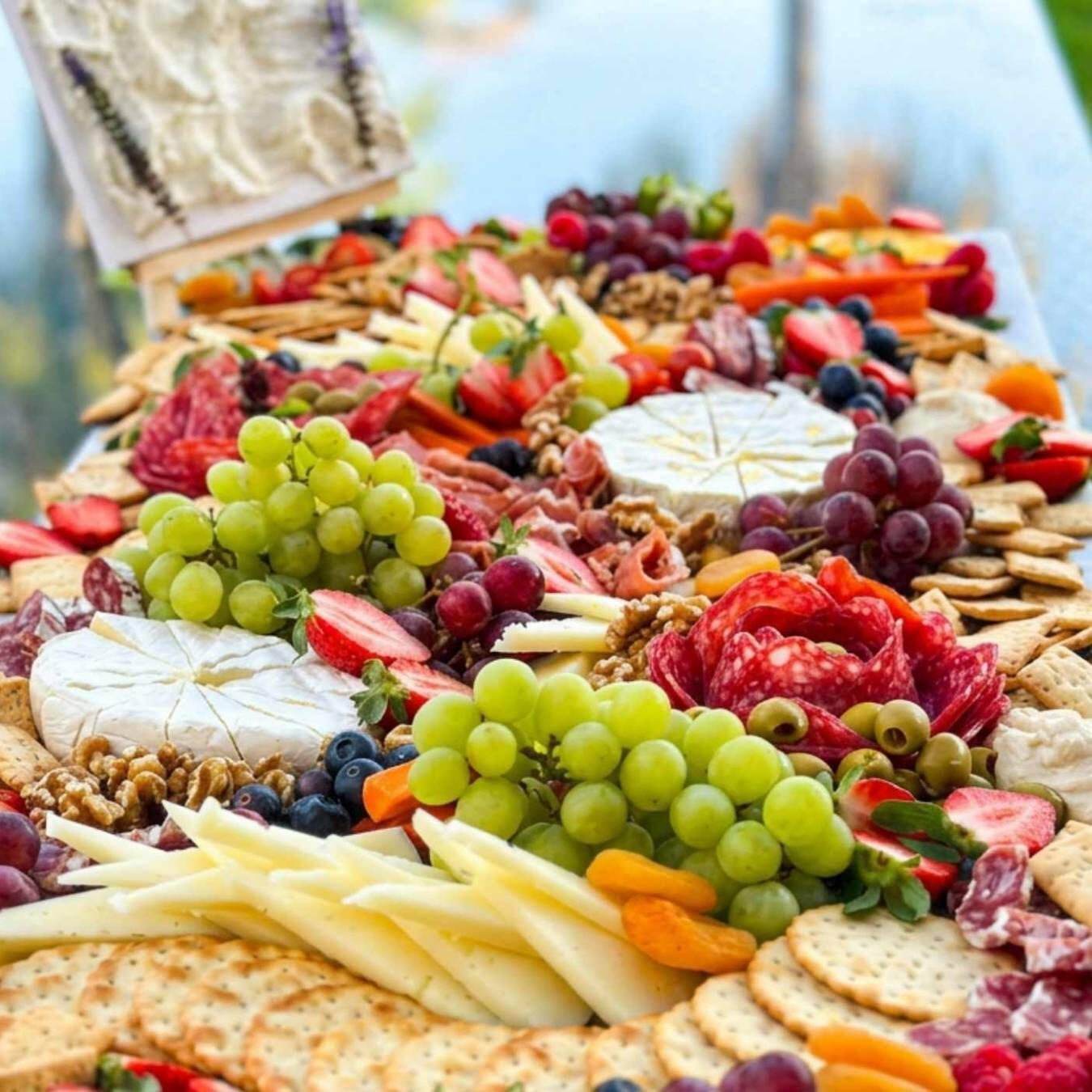 Cheese and fruit grazing table by Elevate Catering
